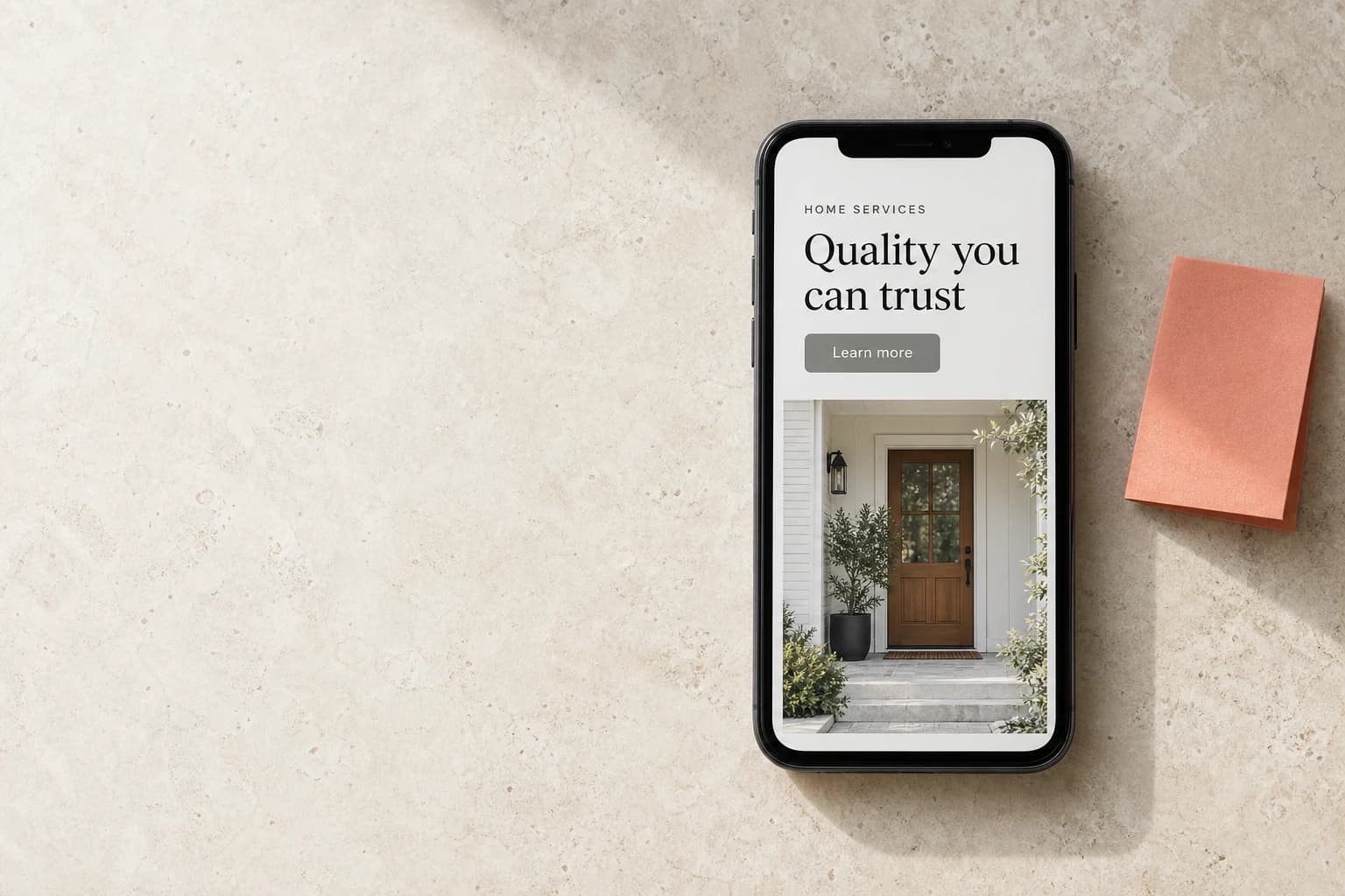 An illustrative home-services website on a phone: the headline reads Quality you can trust above a Learn more button